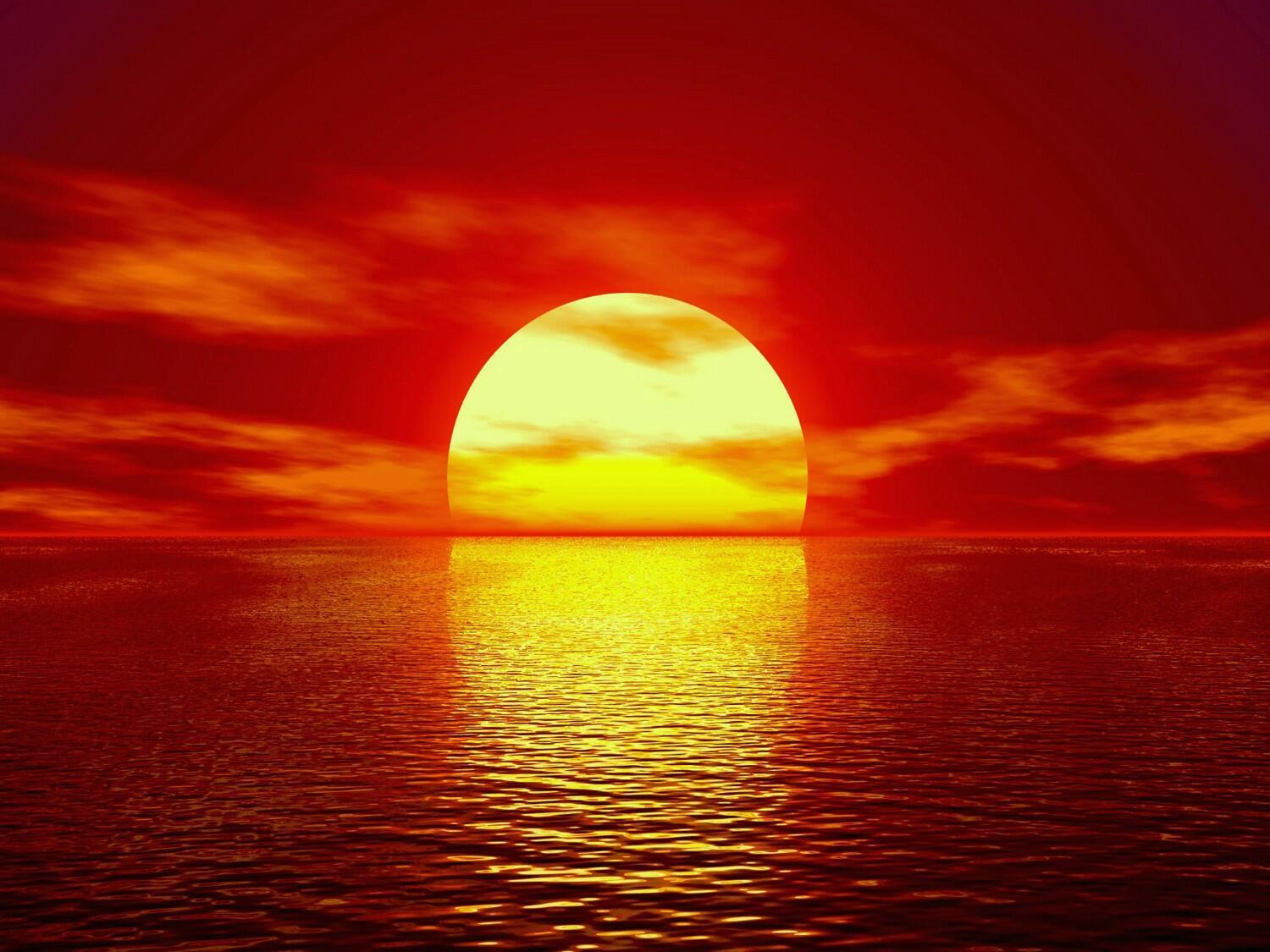Солнце встает над морем